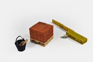 Set de miniaturas | Serie Mini materiales: Ladrillo macizo + herramientas de albañil